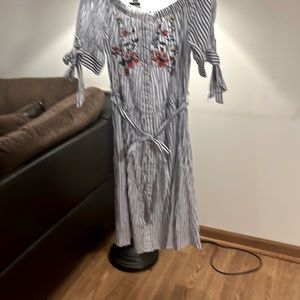 A beautiful striped summer dress size medium with a Belt